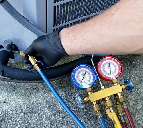 Checking unit for proper refrigerant levels